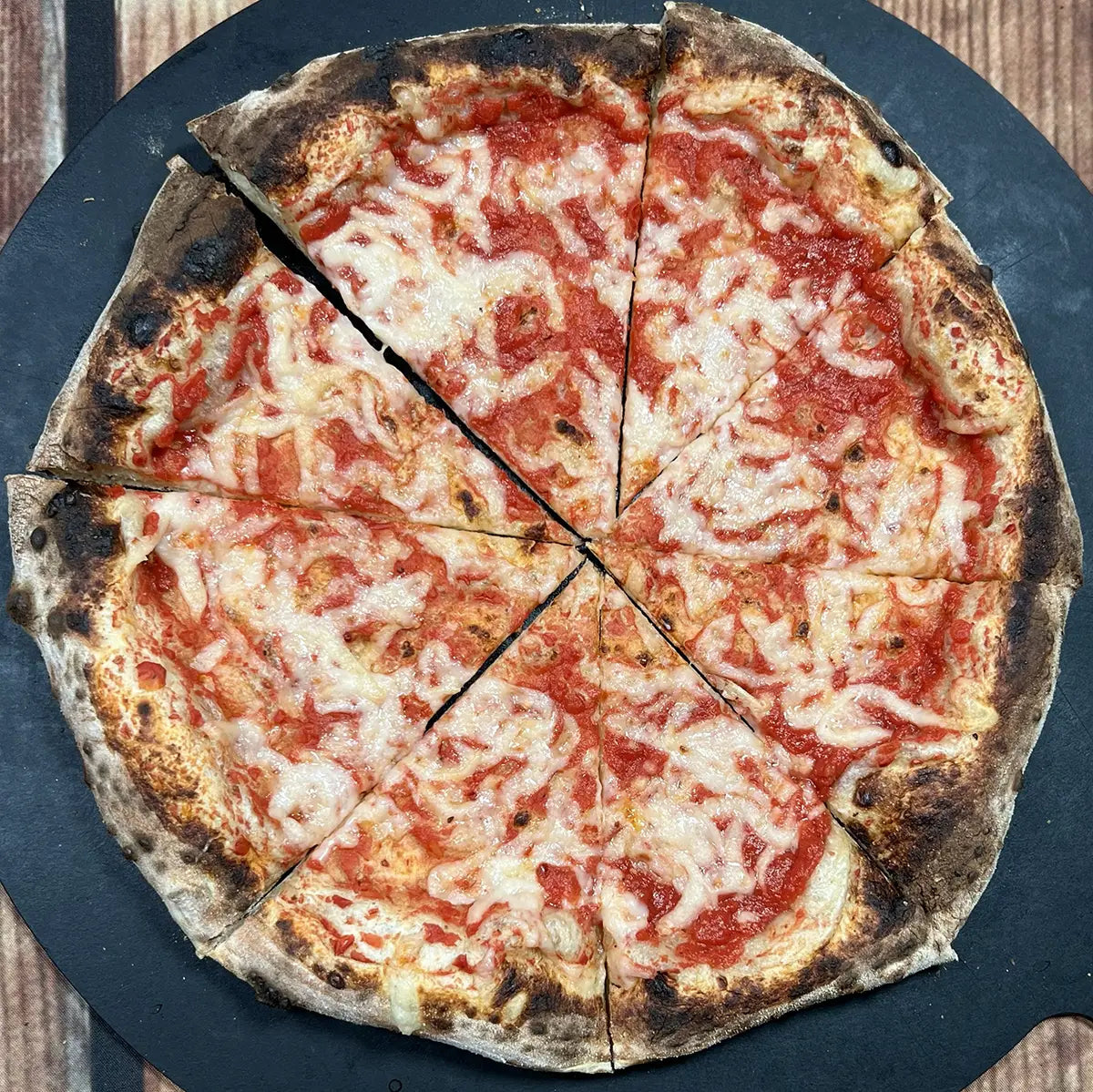 Vegan Cheese Pizza from Fire & Char - Creamy Be-Hive vegan mozzarella on house tomato sauce. Best vegan cheese pizza in Richmond & Henrico, VA.